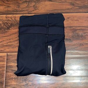 Lululemon Black Zipped Pockets Mesh Bottom Leggings